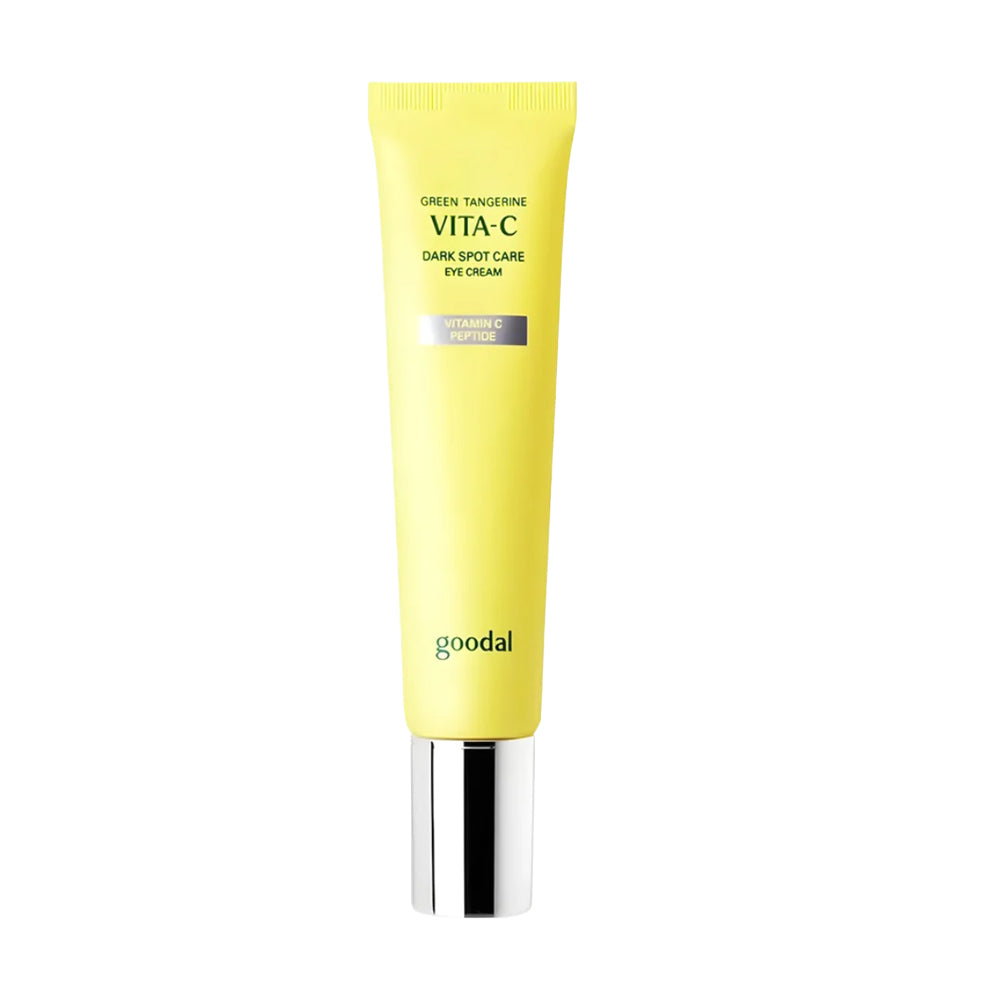 A tube of Goodal Vita-C Green Tangerine Dark Spot Care Eye Cream in a bright yellow packaging with a reflective silver cap, centered on a plain white background.