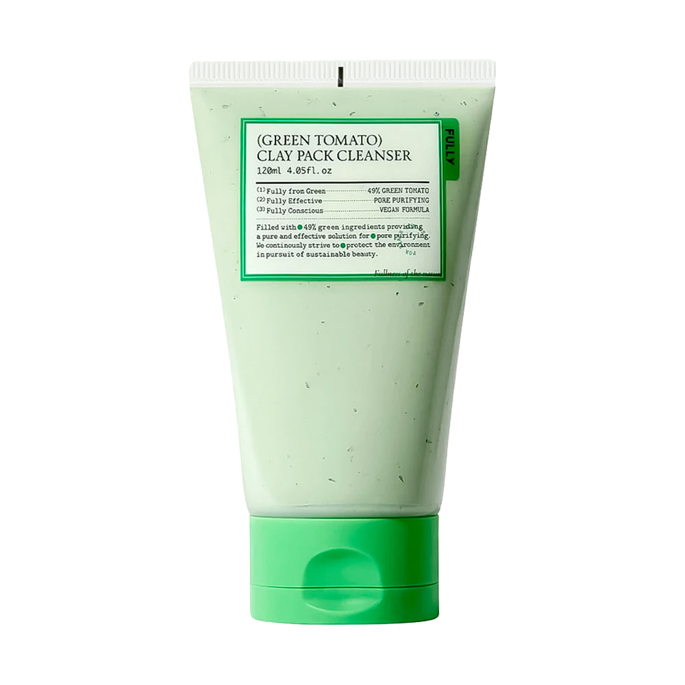 A 120ml squeeze tube of Clay Pack Cleanser in Green Tomato, featuring a light green body with darker green speckles, a white cap, and a green label with white text.