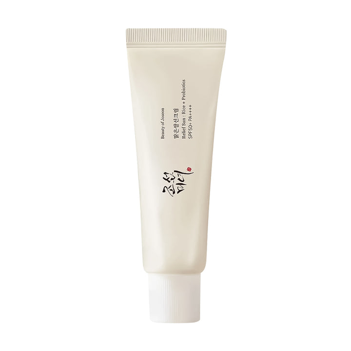 A single tube of Beauty of Joseon SPF50+ PA++++ sunscreen cream on a solid white background. The tube is a warm off-white/cream color with black text and a small red dot logo, and has a white cap.
