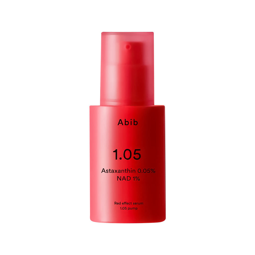 Red serum bottle with 'Abib' branding on a white background