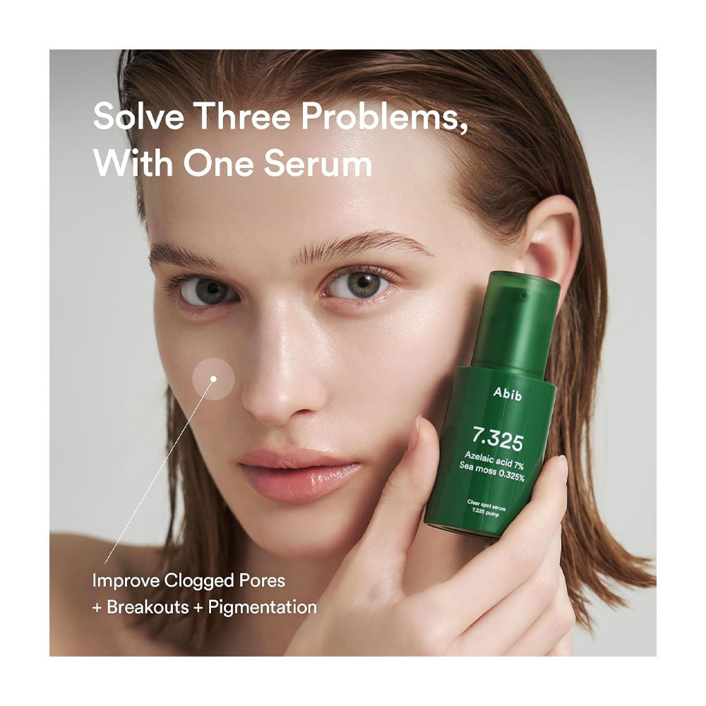 A woman holds a green Abib 7.325 serum bottle against her cheek, with promotional text reading 'Solve Three Problems, With One Serum' and 'Improve Clogged Pores + Breakouts + Pigmentation.