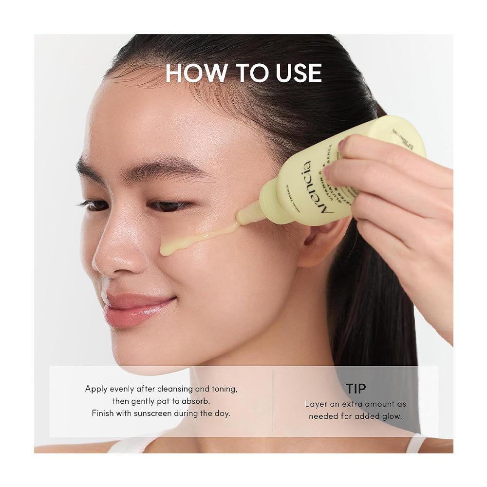 A woman applies a pale yellow skincare serum from a tube labeled 'Mizlan' onto her cheek, with text overlays explaining how to use and suggesting an extra layer for added glow.