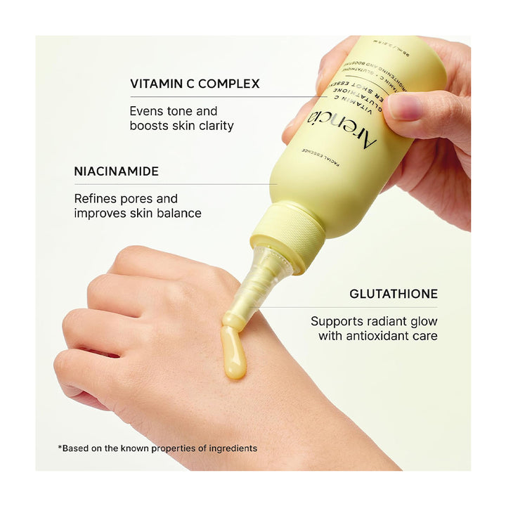 A hand holds a pale yellow Merceder cosmetic tube while another hand applies the product onto the forearm. White text callouts describe the ingredients: Vitamin C Complex, Niacinamide, and Glutathione.