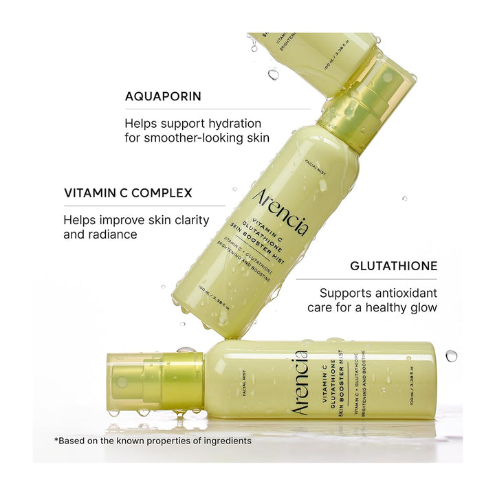 Three clear pump bottles of Arenia Vitamin C &amp; Glutathione Serum arranged diagonally on a white background with text callouts for Aquaporin, Vitamin C Complex, and Glutathione.