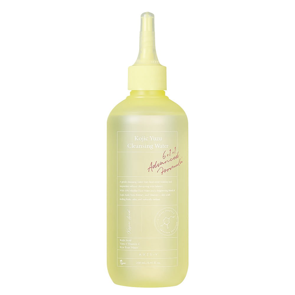 A 250ml bottle of Kojic-Yuzu Cleansing Water with a pale yellow liquid inside and a matching pale yellow dropper cap, shown on a solid white background.