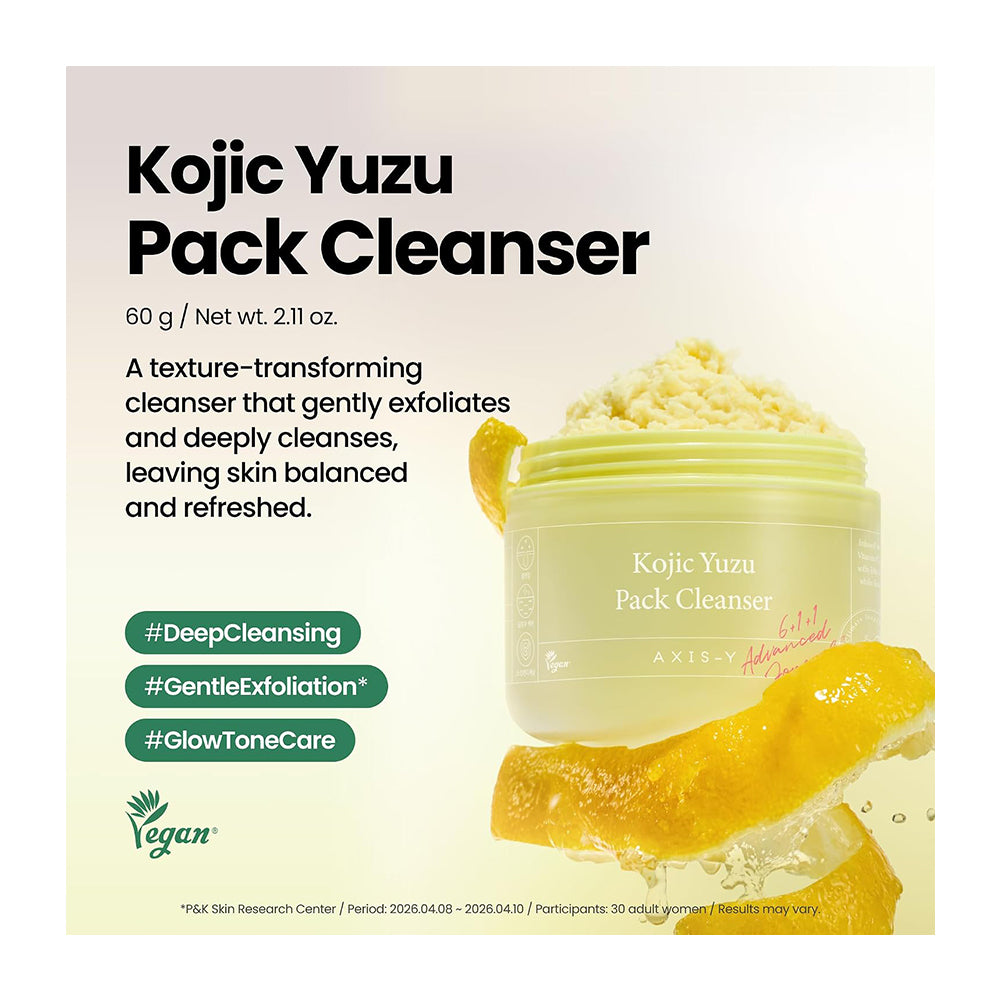 A skincare product listing graphic for Axis of Beauty Kojic Yuzu Pack Cleanser. The image features a light green jar of the cleanser with yellow exfoliating granules visible, set against a pale cream background with yellow citrus peel graphics.