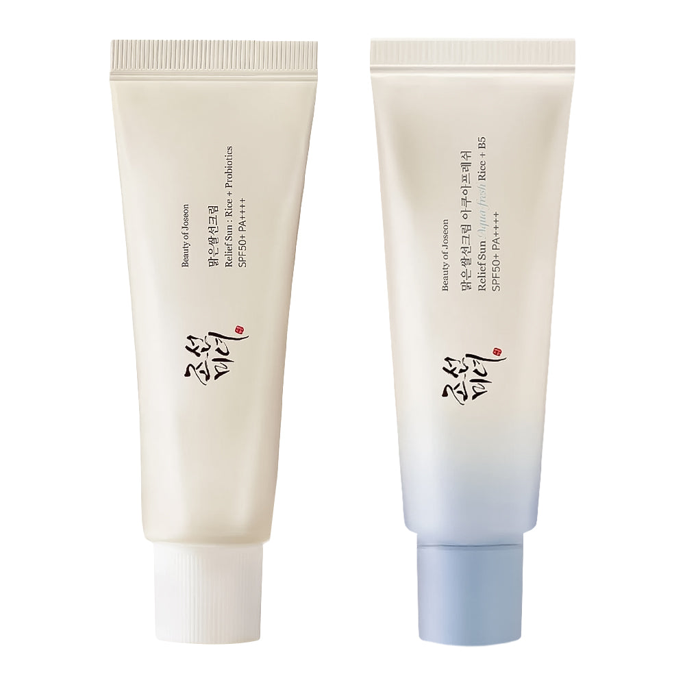 Two cosmetic face tubes from Beauty of Joseon, shown side by side on a white background. The left tube is off-white with black and red text, and the right tube is white fading to light blue at the bottom with a light blue cap.