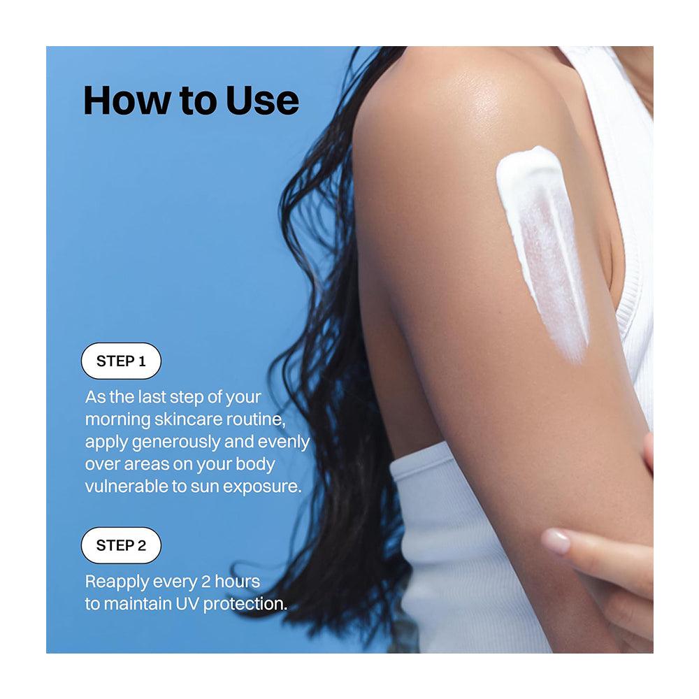 Instructional graphic showing a person applying white sunscreen cream onto their upper arm against a bright blue background, with text reading &