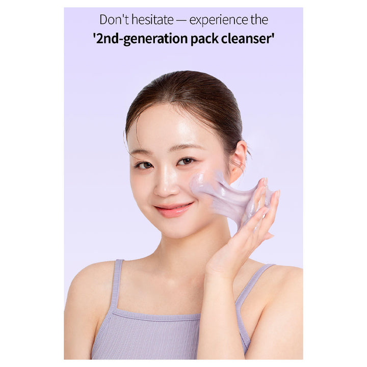 A woman with her hair pulled back wears a lavender ribbed tank top and applies a translucent purple cleanser gel to her cheek against a light lavender background with promotional text at the top.