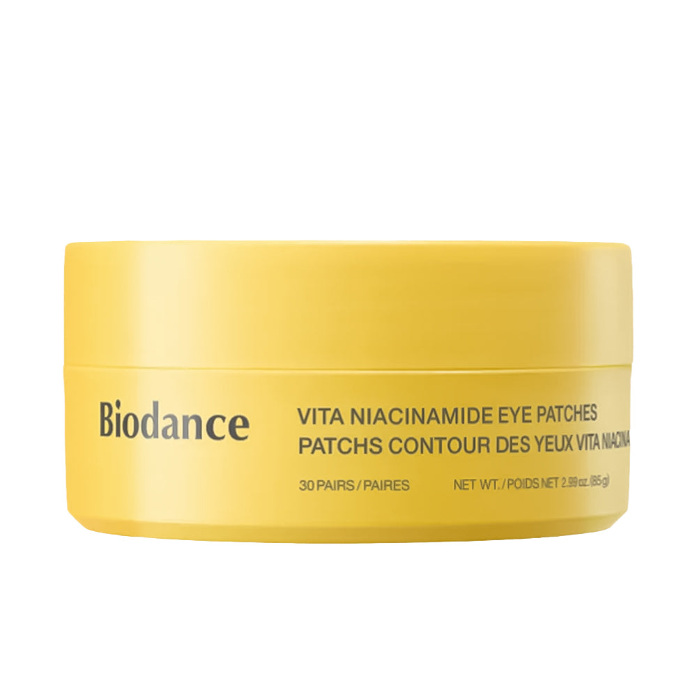 A yellow cylindrical jar of Biodance Vita Niacinamide Eye Patches on a solid white background.