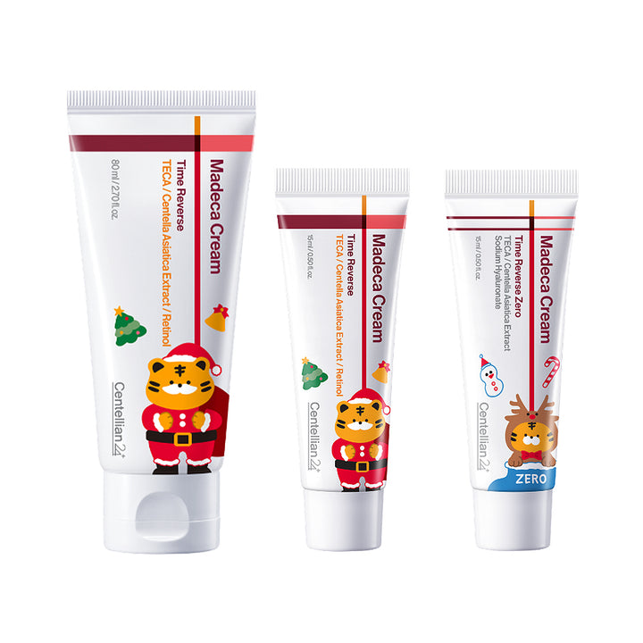 Three white tubes of Garamjandi Madaecia Cream shown on a plain white background, each with a different holiday-themed cartoon illustration and label accents.