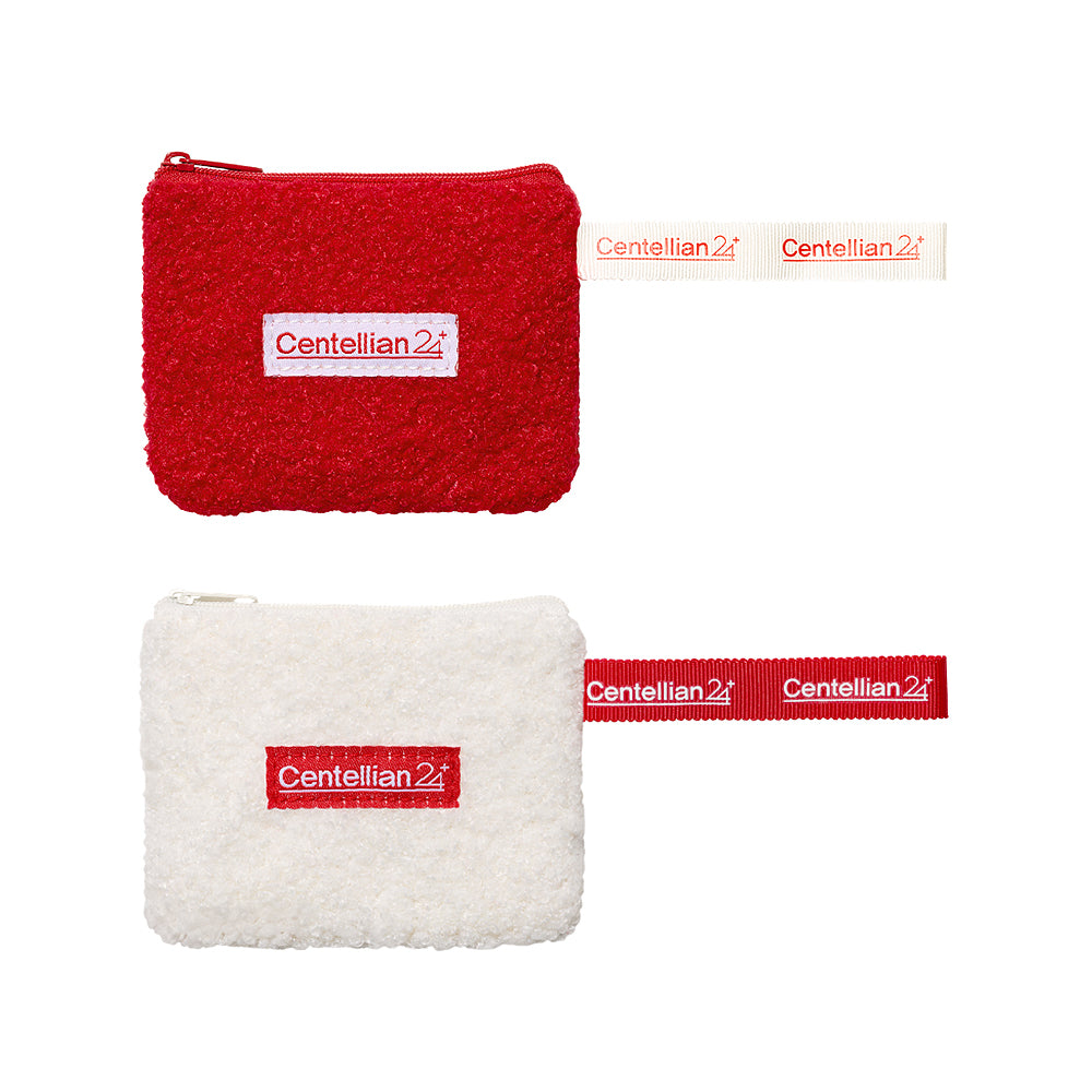 Two small zip pouches with fuzzy textured fabric and branded fabric pull tabs. The top pouch is bright red, and the bottom pouch is off-white/cream.