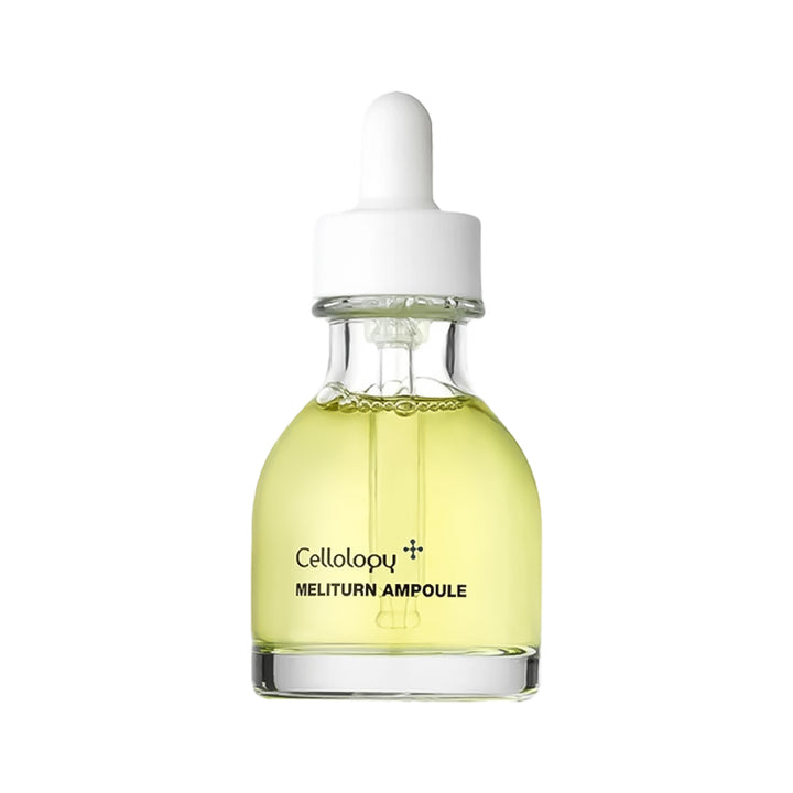 A clear glass dropper bottle containing a pale yellow liquid, with a white rubber and plastic dropper cap. The bottle is labeled &