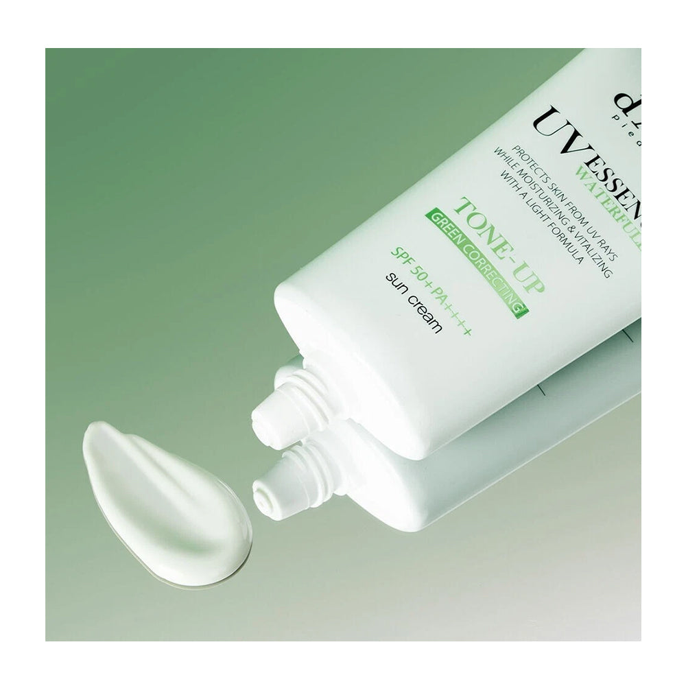 A white tube of UVVESSEN TONE-UP sun cream with a dollop of white cream in front, set against a soft green gradient background.