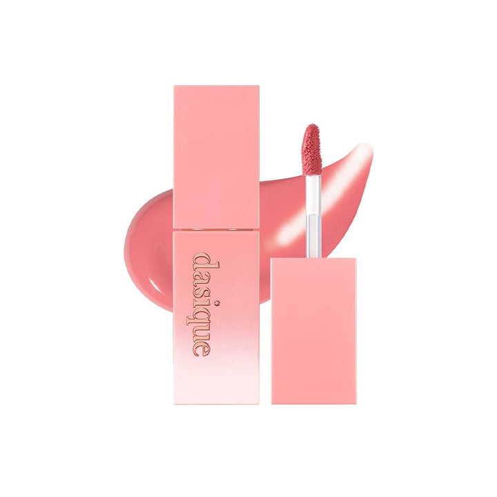 Pink lipstick with packaging on a white background