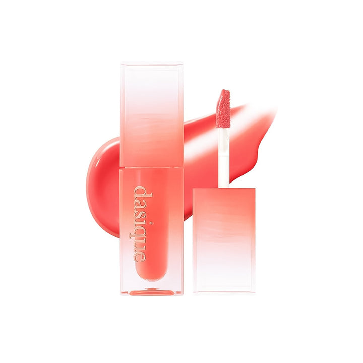 Lip tint with applicator and packaging on a white background