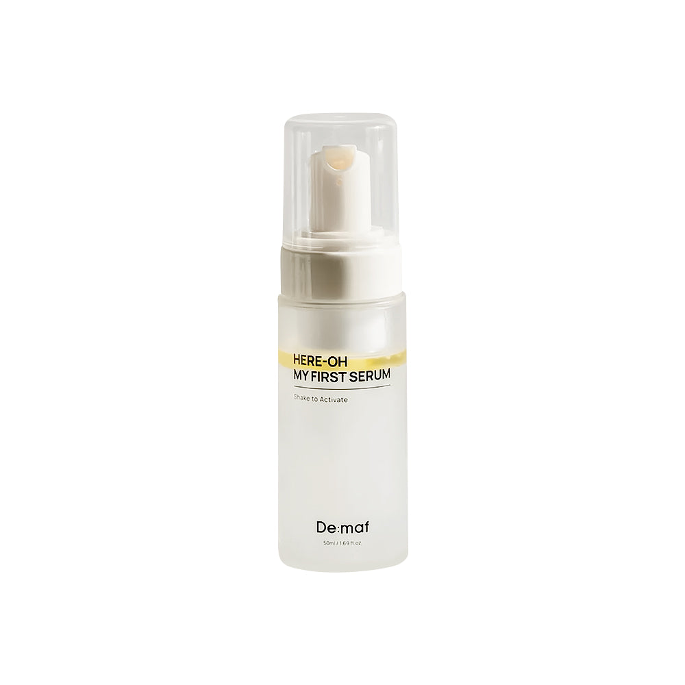 Skincare serum bottle labeled &