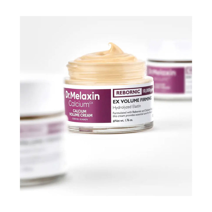 Dr. Melaxin Calcium EX Volume Firming Cream jar with visible cream on top on a white background