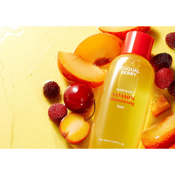 A bottle of Equal Berry Vitamin Illuminating Toner surrounded by fresh fruit slices and berries on a yellow surface.
