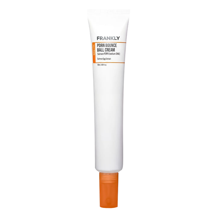 White tube with orange cap in white background