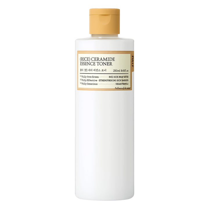 Rice Ceramide Essence Toner bottle with a beige cap on a white background