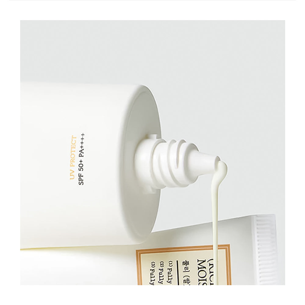 Tube of sunscreen with a white cap being squeezed, showing the cream being dispensed.