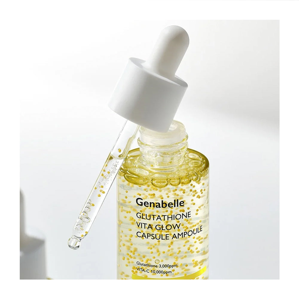 A glass dropper bottle of Genabelle Glutathione Vita Glow capsules, showing a clear dropper filled with golden-yellow liquid and suspended gold capsules against a bright white background.