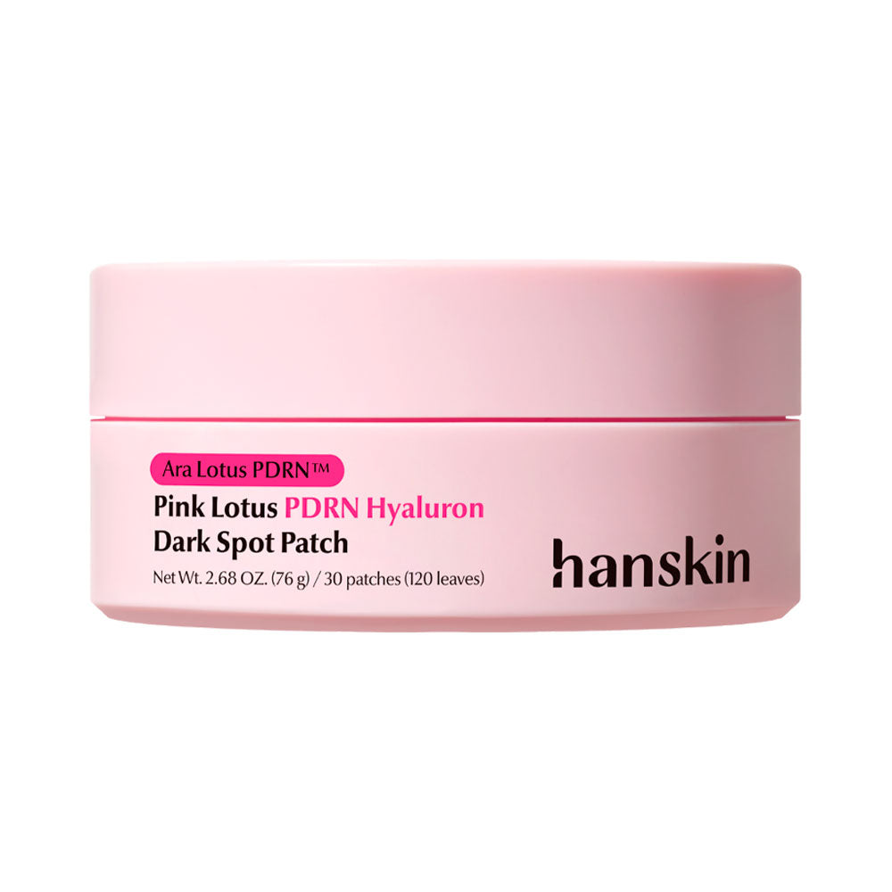 A pink cosmetic jar of hanskin Pink Lotus PDRN Hyaluron Dark Spot Patch on a solid white background.