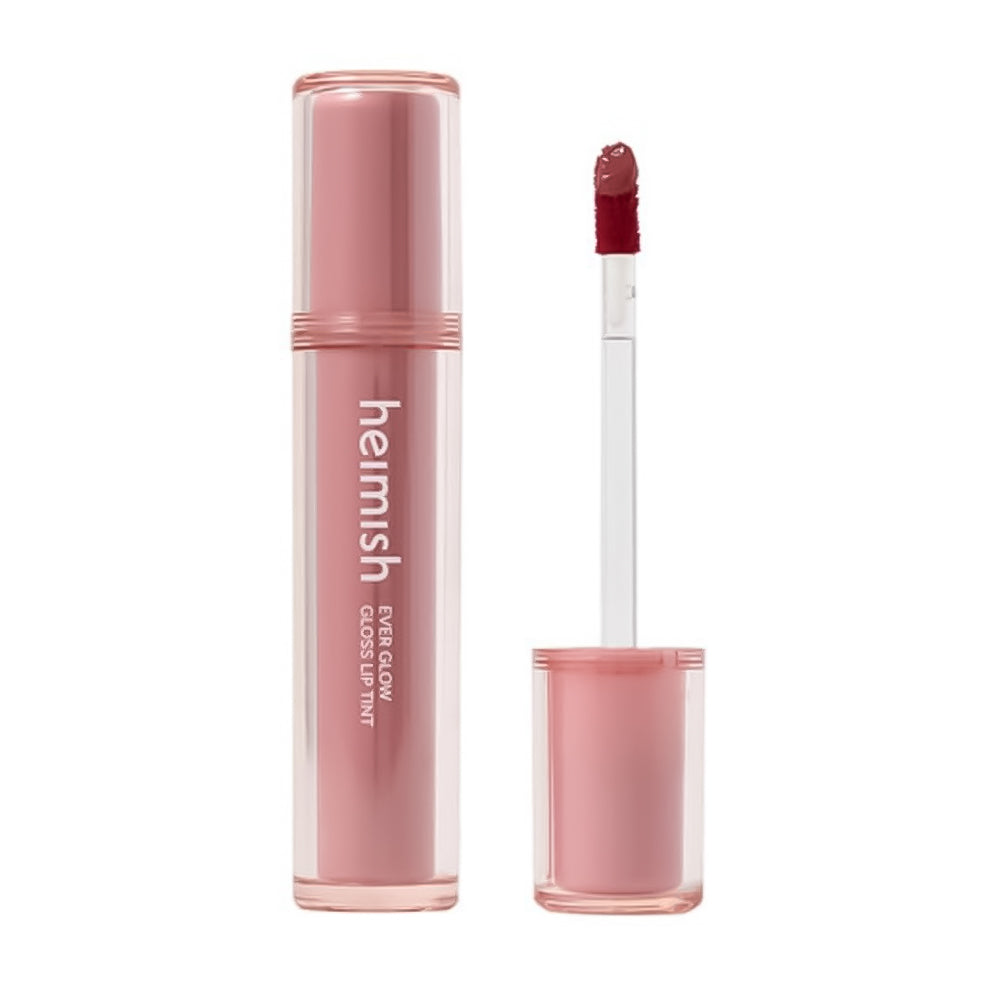 Lip gloss with applicator and open cap on a white background