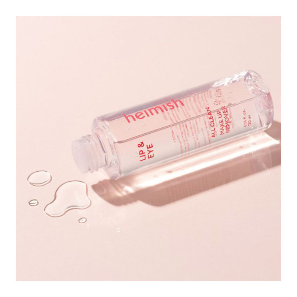 Heimish lip and eye makeup remover bottle on a light pink background