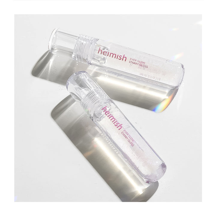 Two clear spray bottles with &