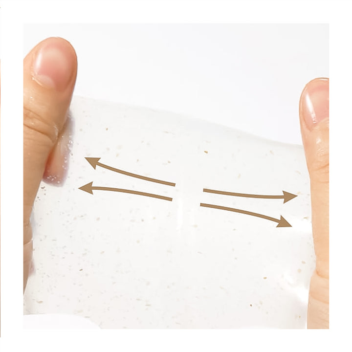 Close-up of a hand stretching a translucent, slightly speckled white sheet or pouch, with brown arrows overlaid to indicate elasticity.