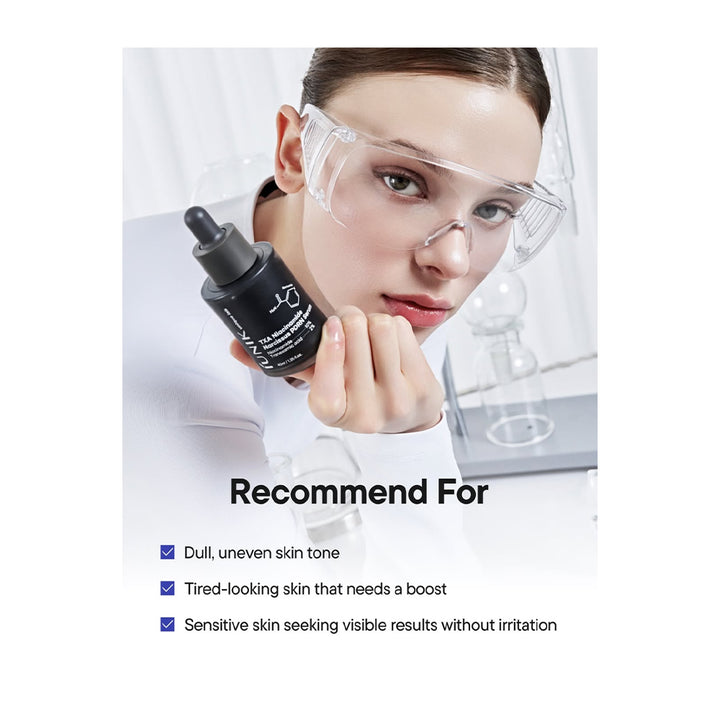 A woman in a white lab coat and clear safety goggles holds a black skincare dropper bottle near her face. Text on the image reads &