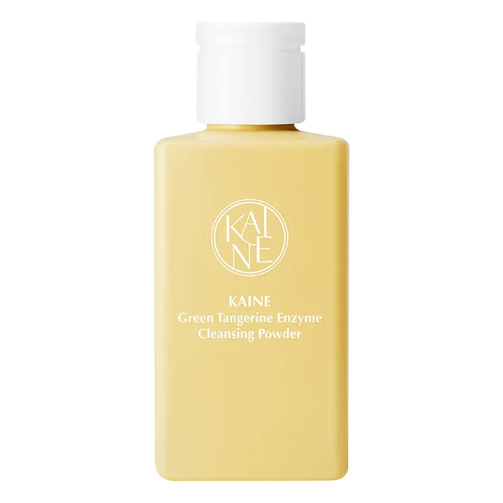KAINE Green Tangerine Enzyme Cleansing Powder in a rectangular pale yellow bottle with a white cap, shown on a plain white background.