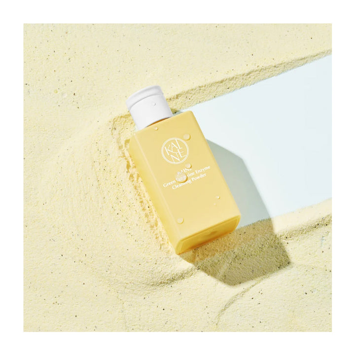 A rectangular yellow sunscreen bottle with a white cap, labeled &