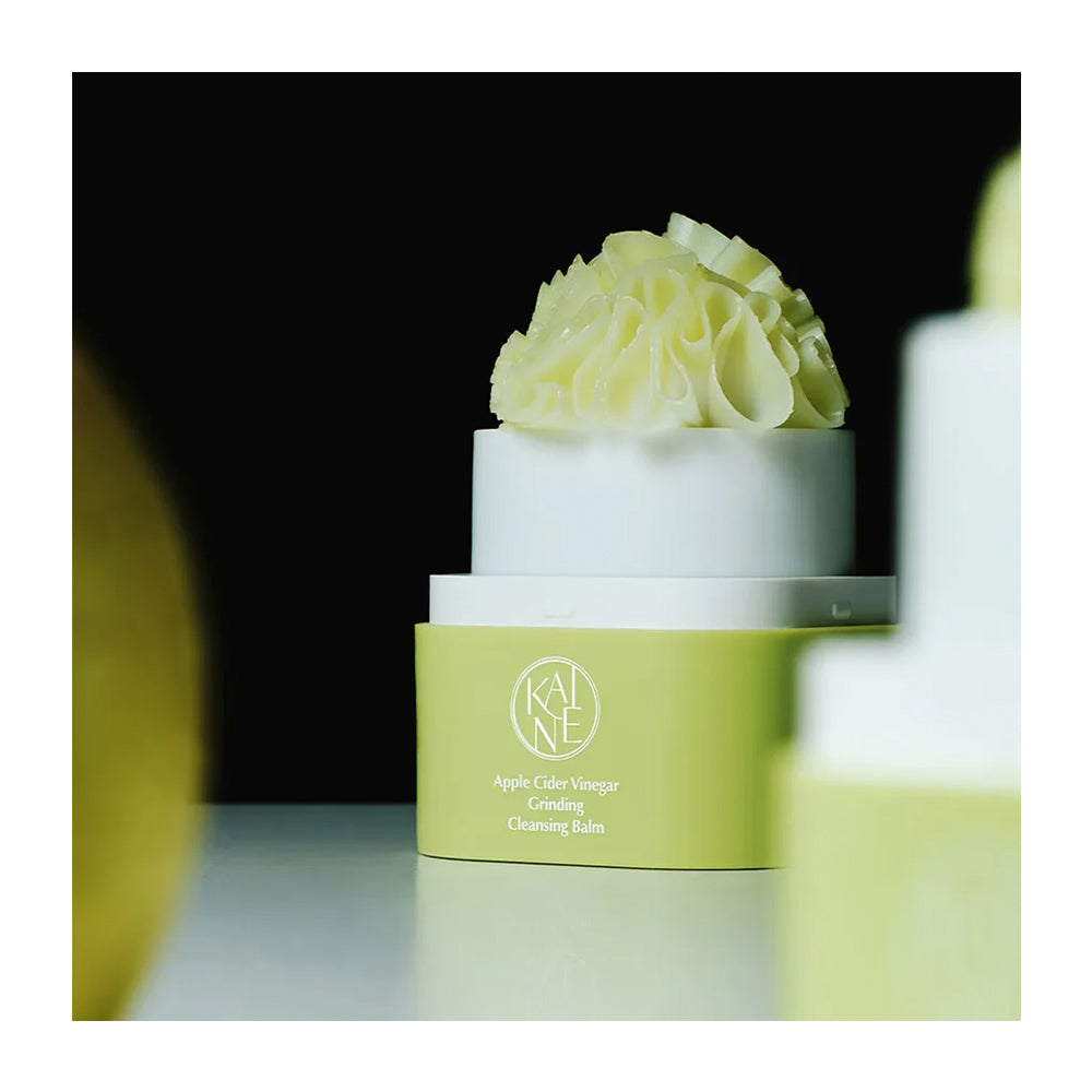 A close-up of a skincare product jar labeled &