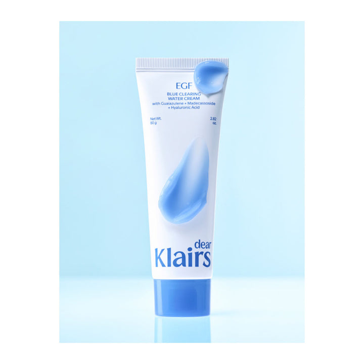 A tube of Klairs Clear Blue Cleansing Mask with EGF, featuring a white body with a blue cap and blue graphic droplet, centered on a light blue background.