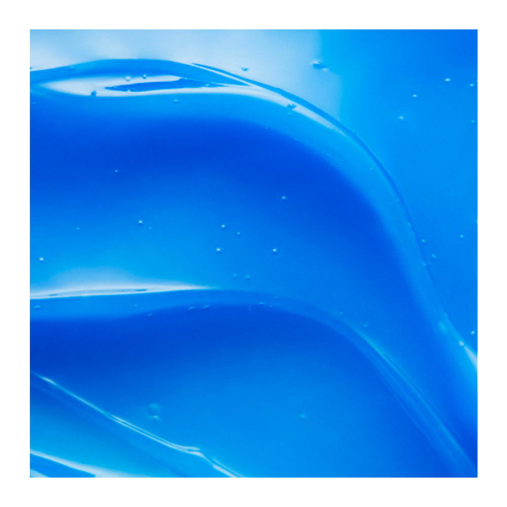 A close-up of a glossy, translucent blue gel or liquid texture with soft wave-like contours and small visible air bubbles, centered on a white background.