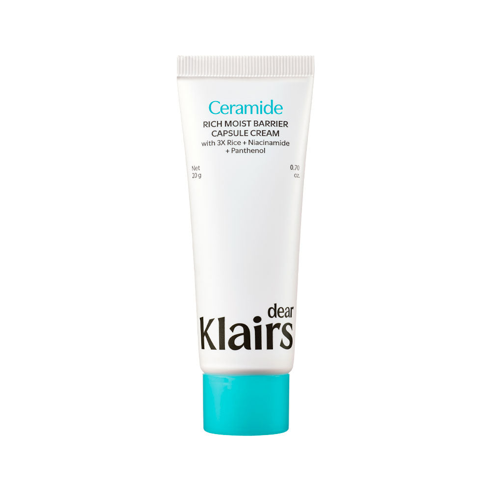 A white squeeze tube of Dear Clairs Ceramide Rich Moist Barrier Capsule Cream with a bright turquoise cap, shown on a plain white background.