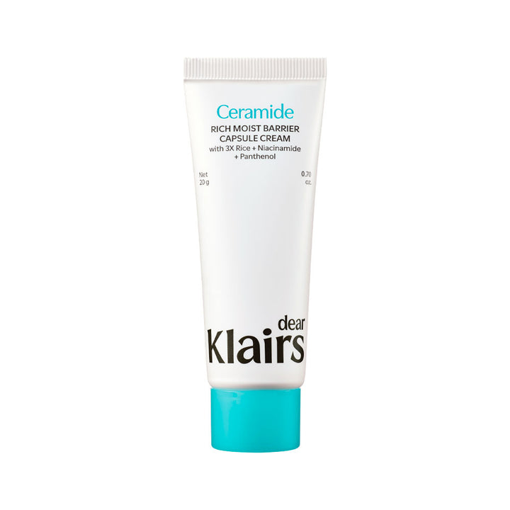 A white squeeze tube of Dear Clairs Ceramide Rich Moist Barrier Capsule Cream with a bright turquoise cap, shown on a plain white background.