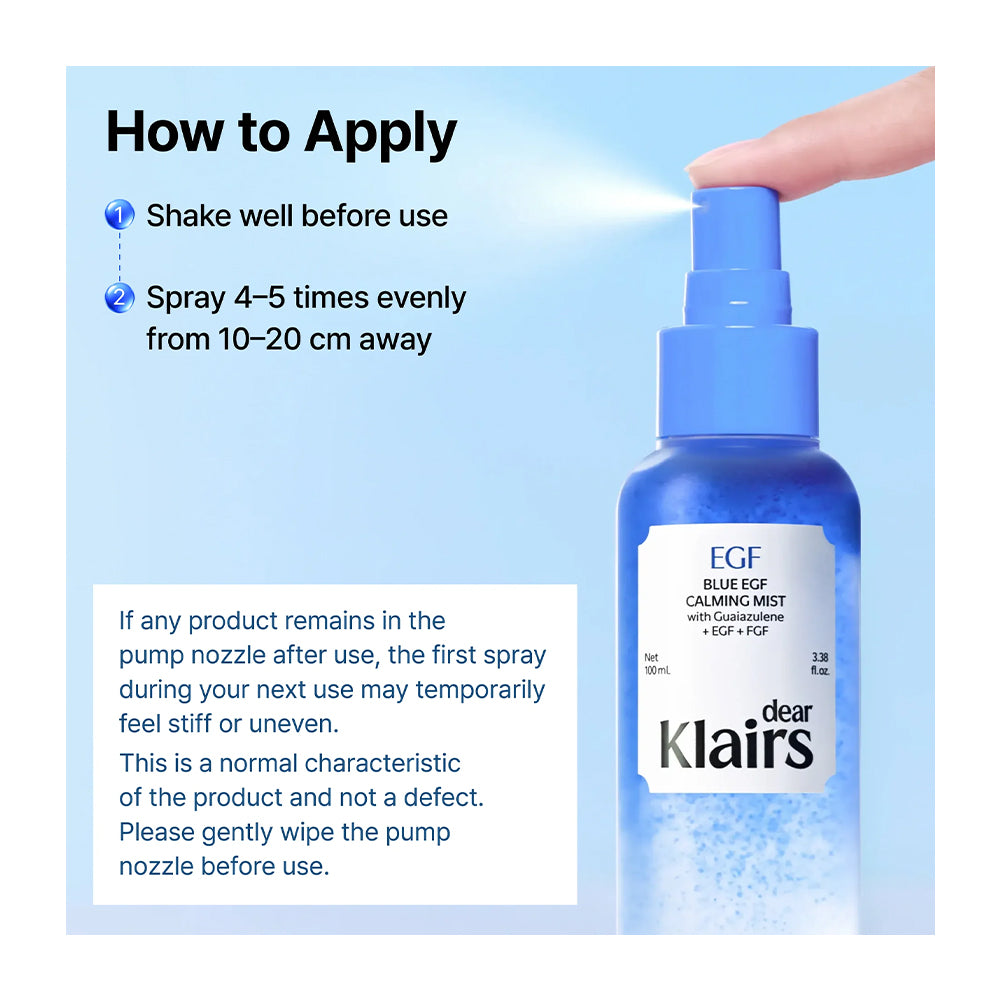 A blue spray bottle labeled &