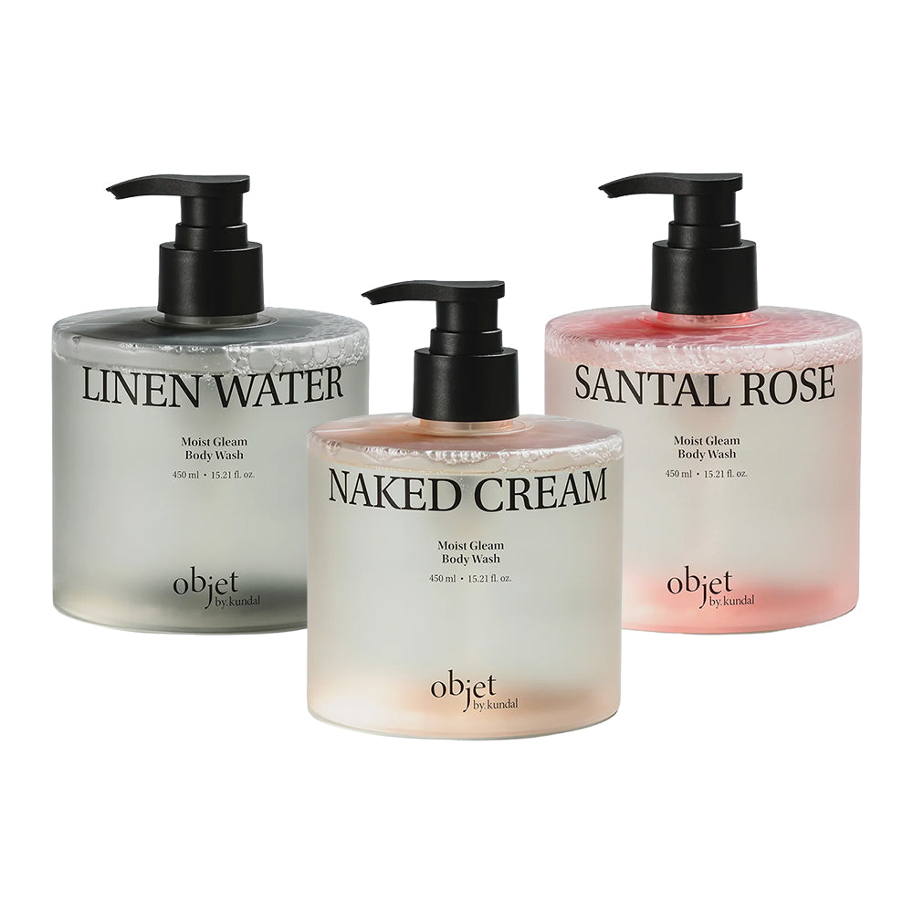 Three round pump bottles of Objet by handcrafted body wash on a white background: LINEN WATER in clear gray, NAKED CREAM in frosted beige, and SANTAL ROSE in soft pink.
