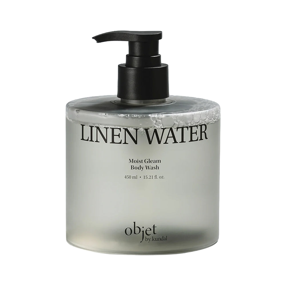 A bottle of Object by Kandi linen water moisturizing body wash with a black pump dispenser and a frosted clear bottle, shown on a plain white background.