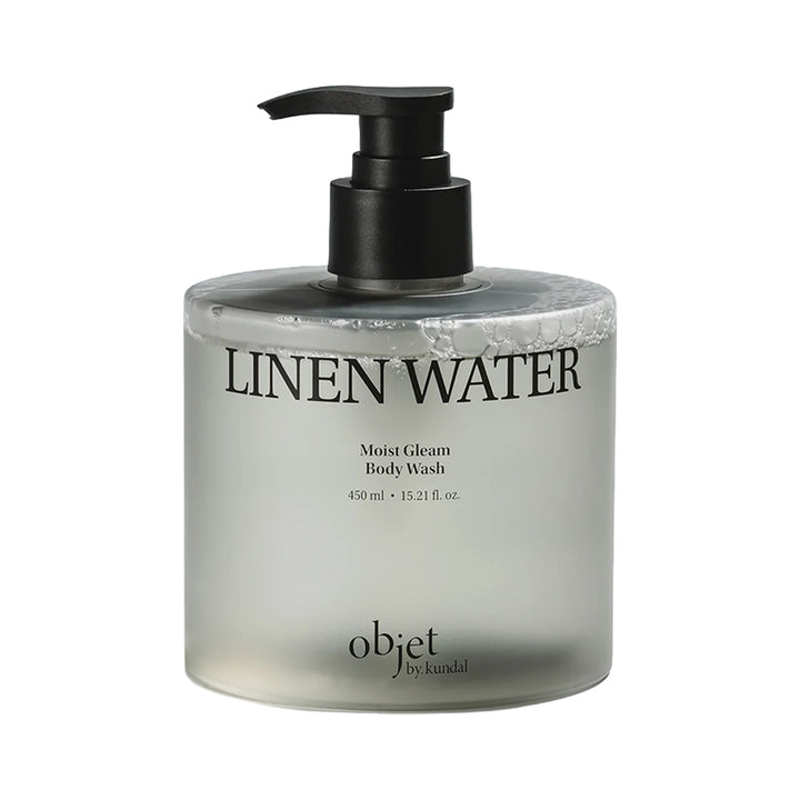 A bottle of Object by Kandi linen water moisturizing body wash with a black pump dispenser and a frosted clear bottle, shown on a plain white background.