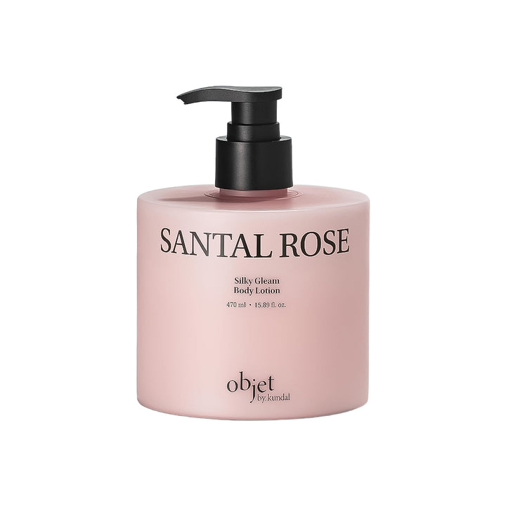 A bottle of objet by kandi Santal Rose Silky Cream Body Lotion in a dusty pink color with a black pump dispenser, shown on a plain white background.