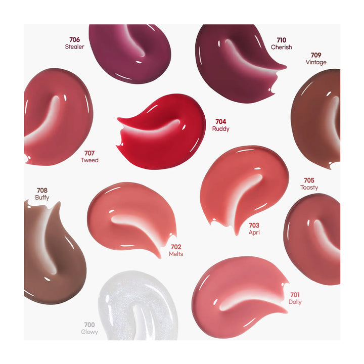 A color chart displaying ten glossy cream swatches of nail polish in various shades, including burgundy, red, pink, brown, and a shimmering silver shade, each labeled with a shade number and name on a white background.