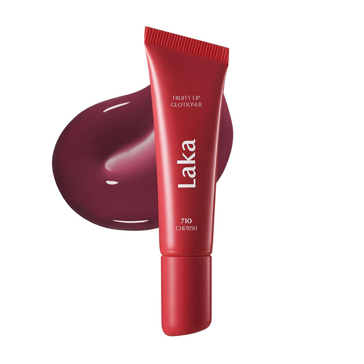 Red Laka lip balm with a swatch of cherry color on a white background