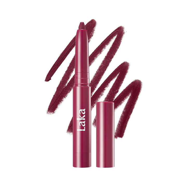 Laka lip crayon in a deep berry plum shade, shown with its cap off next to a matching lip swatch on a clean white background.