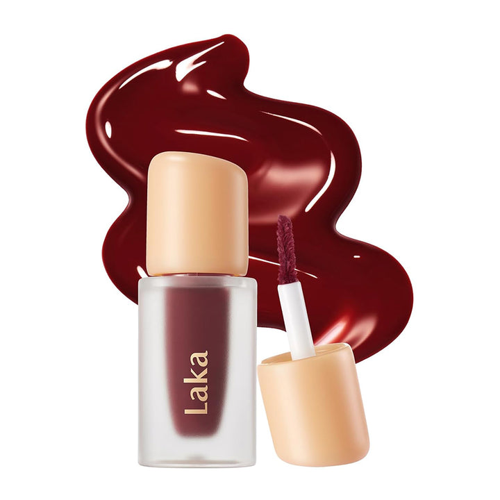 Laka lip product with applicator and red color swatch on a white background