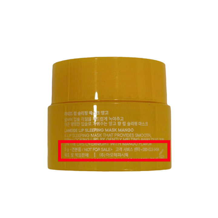 A yellow cosmetic jar of Lanège Lip Sleeping Mask Mango with white text and a red horizontal stripe on the front marking NOT FOR SALE, set against a plain white background.